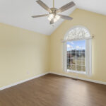Formal dining room off the entry that can be used as a home office or study.