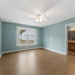 Large master bathroom featuring a standing shower and a jetted tub in a split bedroom floor plan.